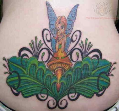 Green Leaf And Fairy Tattoo On Lowerback